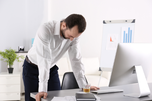 depressed man at work